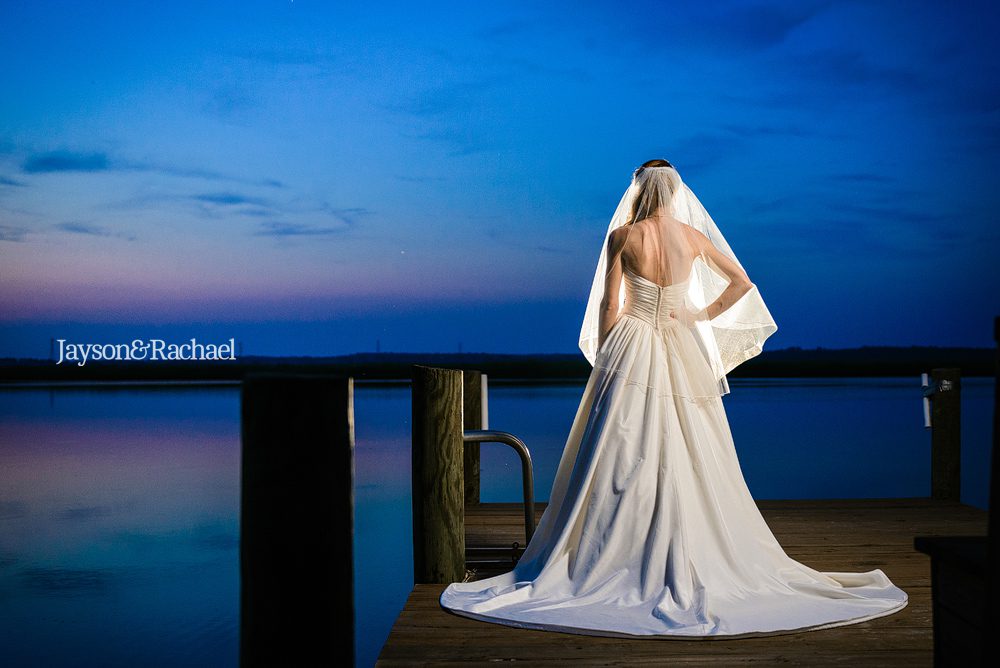 Bridal portraits on a dock by the river